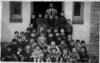 Maestro y niños de la escuela de Ágreda